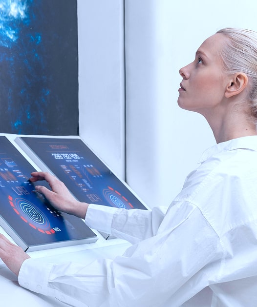 side view woman working digital monitors 2 min